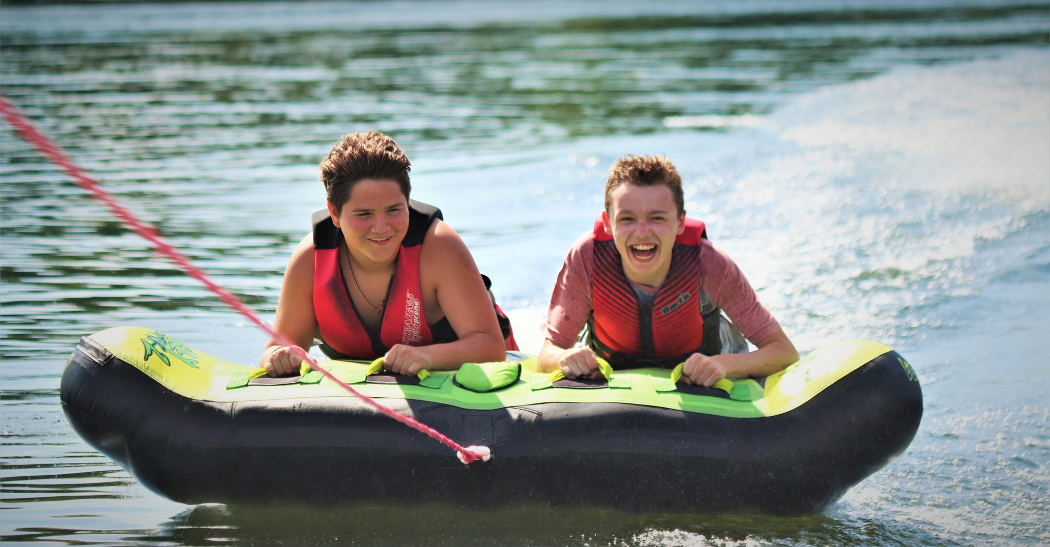 Two Camp Crosley boys wakeboarding.